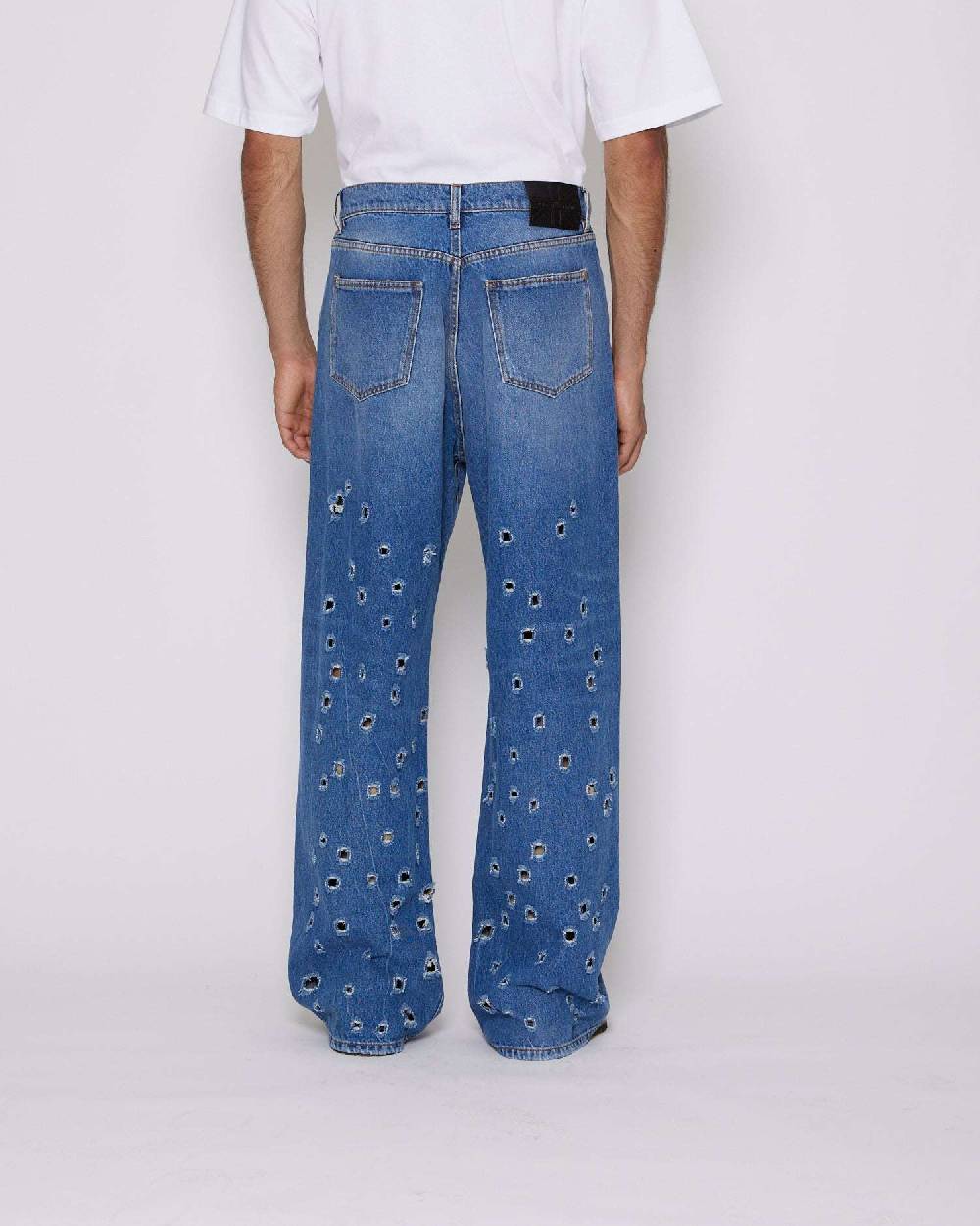 John Richmond Jeans gamba larga con fori metallici sul davanti Pezzi Unici